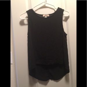 Black almost sheer top.